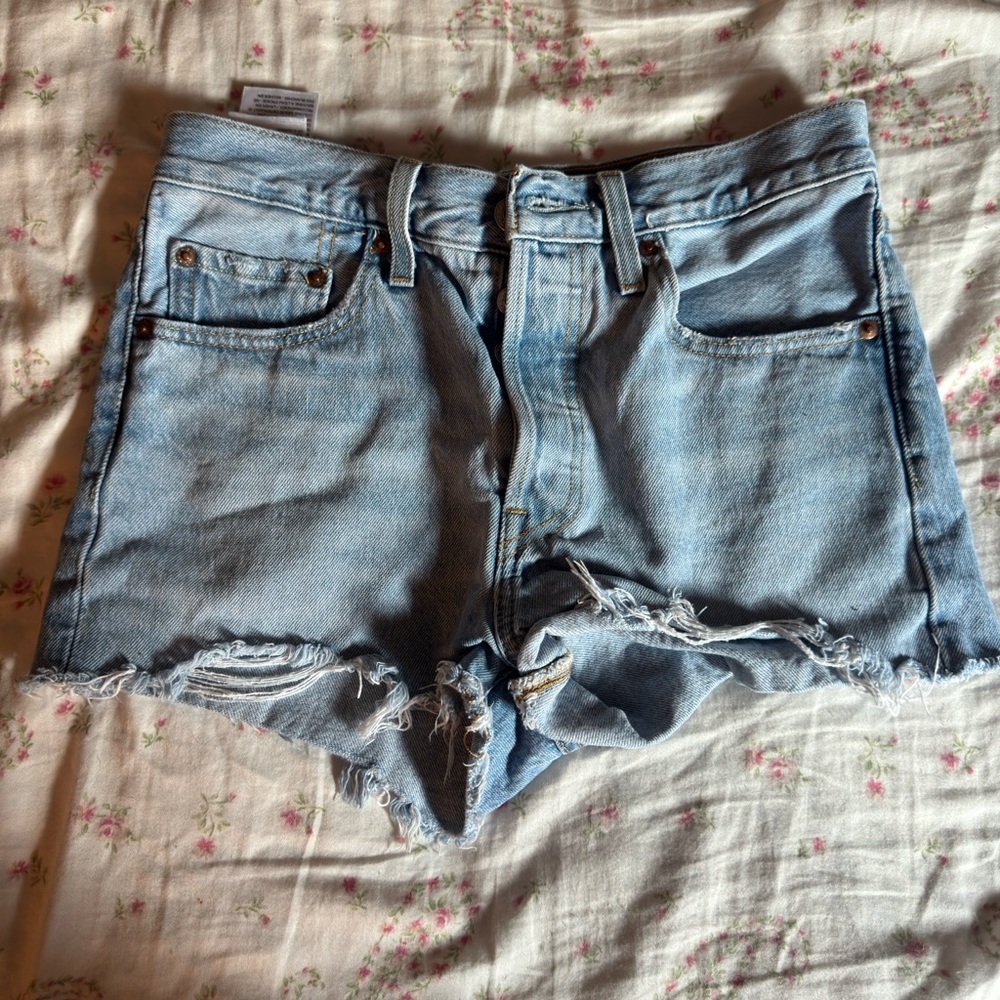 Levi's Light Blue Frayed Denim Cutoff Shorts
